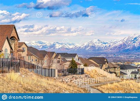 Hill Houses Overlooking Scenic Panorama Of The Valley And Snowy Wasatch