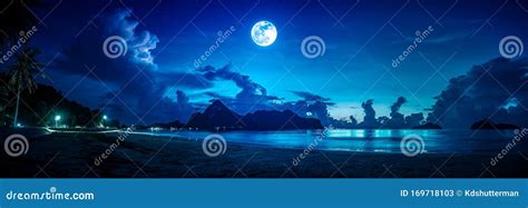 Colorful Blue Sky With Cloud And Bright Full Moon On Seascape To Night