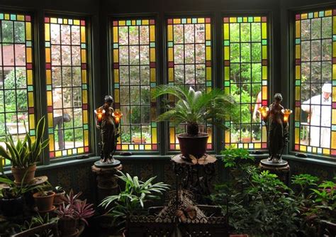 a conservatory look at those stained glass windows it s my own herbology classroom covet