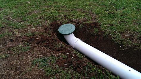 Adding drainage pipe for downspout rainwater around the house. How To Install Pop Up Drain Emitter - Best Drain Photos ...