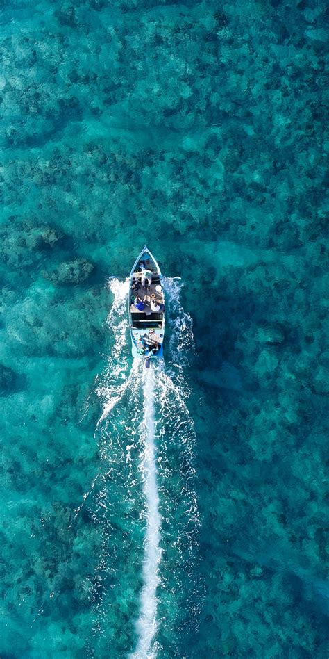 Download Wallpaper 1080x2160 Boat Holiday Blue Sea Aerial View