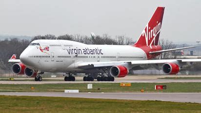 Vietnam airlines' cabin crew wear an áo dài , vietnam's national costume. Welcome to the Mono360 blog: Sacked Cabin Crew Members Sue ...