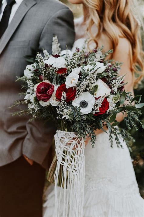 Romantic red wedding bouquets are perfect for nearly every wedding season, but we especially love these punchy bundles of blooms for a wedding on valentine's day. 21 Ultra Unique Winter Wedding Bouquets | weddingsonline