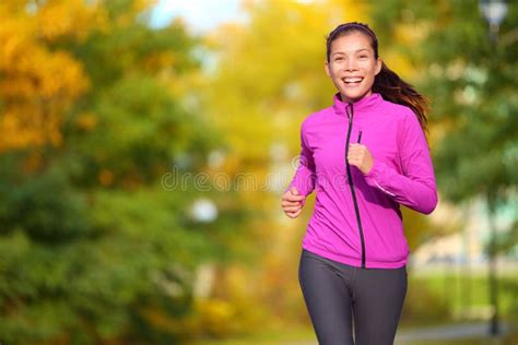 Female Jogger Young Woman Jogging In The Park Stock Photo Image Of
