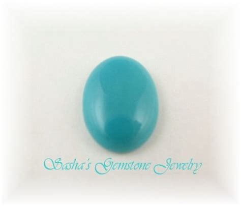 X Oval Turquoise Cabochon Gs