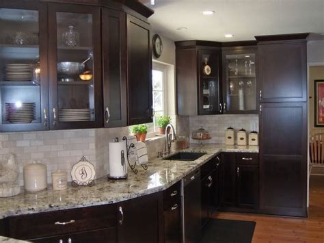 Colonial white's slight movement and variation mean it offers a continuous and cohesive feel. white granite countertops white tile backsplash cherry ...