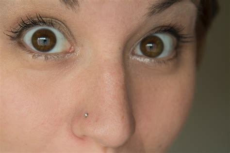 9 emotional stages of getting your nose pierced