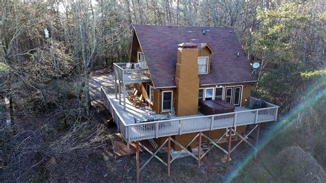To a world of beauty, peace and tranquility that. Luxury Mountain Cabin Rental with a Hot Tub in Helen, Georgia