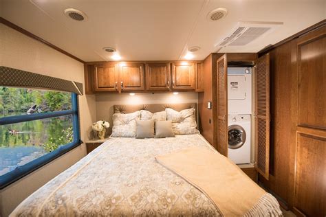 These second rooms push the measuring tape to its limits since they have to make sure there is enough space in each room to be livable. 2016 Dynamax DX3 37BH bedroom view featuring a comfy King ...