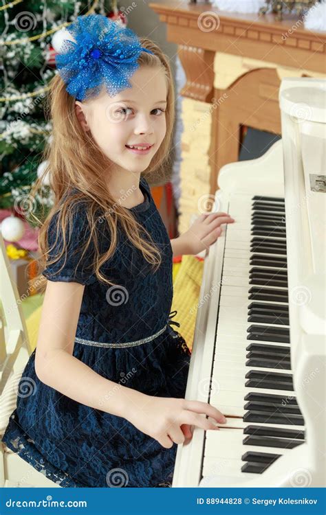 Little Girl At A White Grand Piano Stock Photo Image Of Kids Child