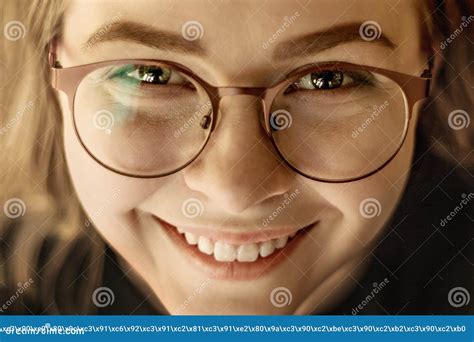Portrait Of A Smiling Face Of A Young Girl In Glasses Close Up Stock