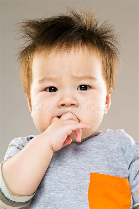 Baby Boy Sucking Finger Into Mouth Stock Image Image Of Cute Brown