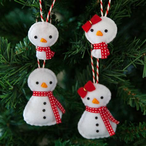 Christmas inflatables can turn the most basic yard into a fun, festive holiday setting. snowman family christmas tree decorations by miss shelly ...