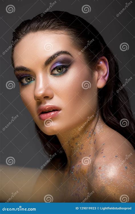 beautiful brunette girl posing with glitter on body stock image image of brunette glamor