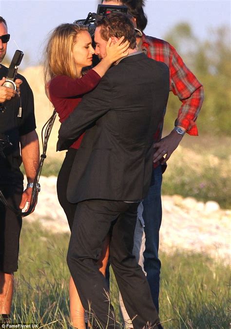 natalie portman is locked in a tender embrace with michael fassbender for new terrence malick