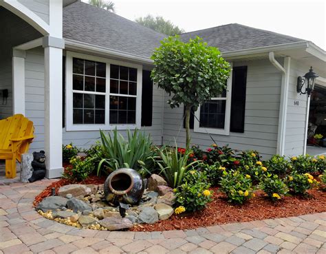 When you look at each photo, imagine the front yards if they the spiral trimmed topiary standing right in front of the brick stone house has their own spotlight while the. Landscaping ideas for small front yards - Contemporary-design