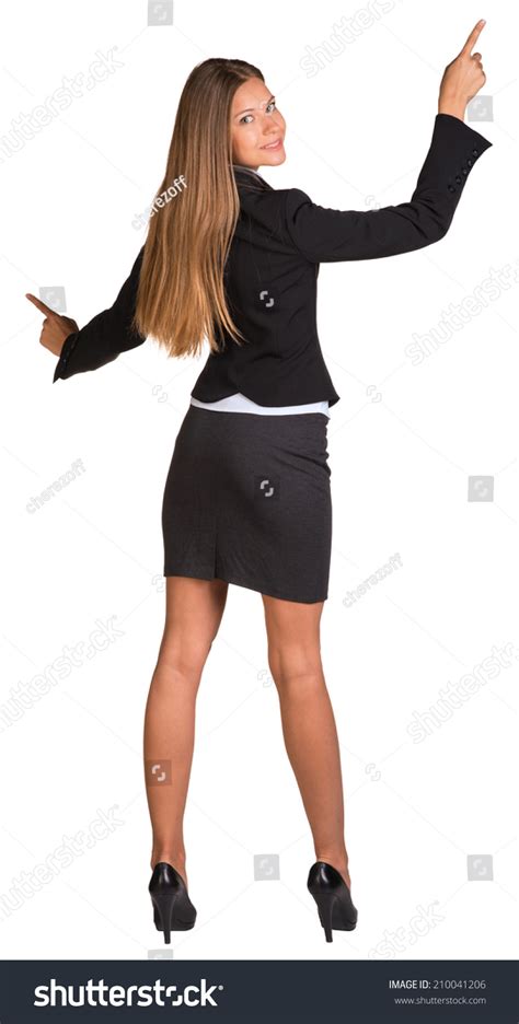 Businesswoman Pushing Fingers Opposite Directions Stock Photo