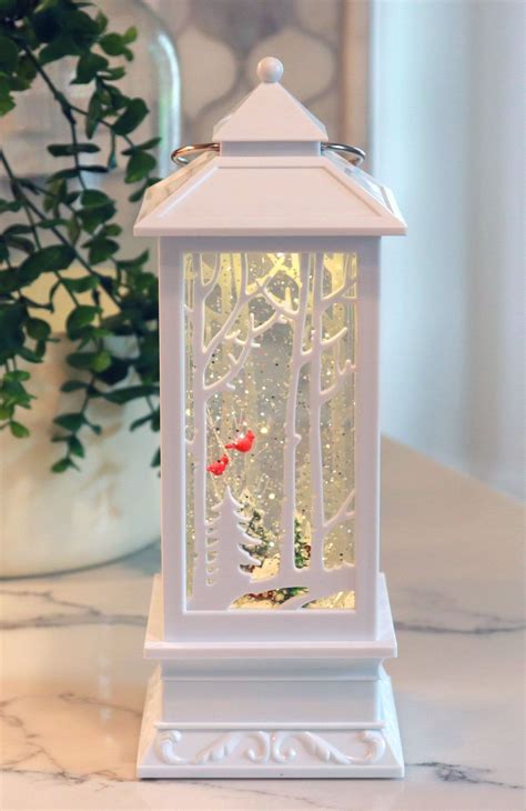 White Carved Design Lighted Water Lantern With Church In Woods