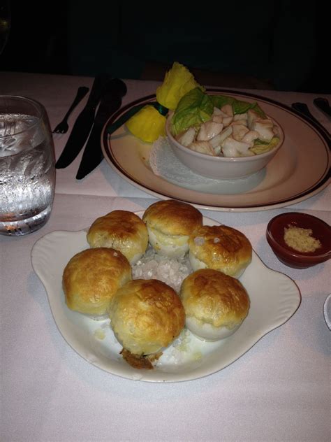 Butter of escargot a la burgundy. Escargot with puff pastry tops, crab cocktail in the ...