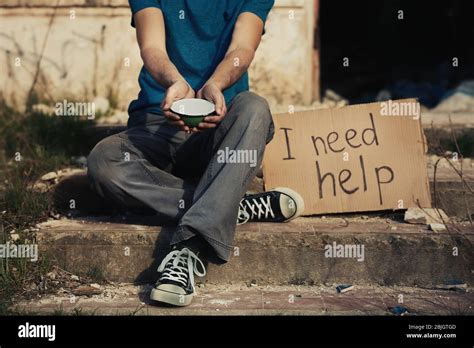 Man Begging For Help On The Street Stock Photo Alamy