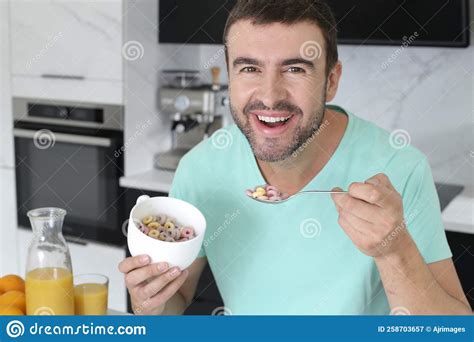 Man Having Some Cereals For Breakfast Stock Image Image Of Food Dairy 258703657