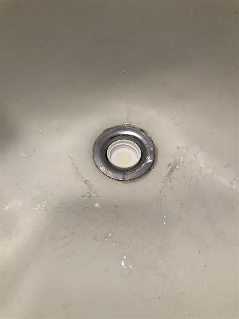 Here's how you can use a plumbing snake for a bathroom sink not draining: I dropped this cap in my sink that doesn't have a drain ...