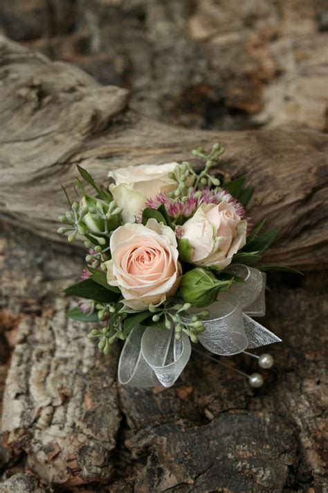 this is beautiful for bridesmaids corsages i would like 6 8 spray roses here prom flowers