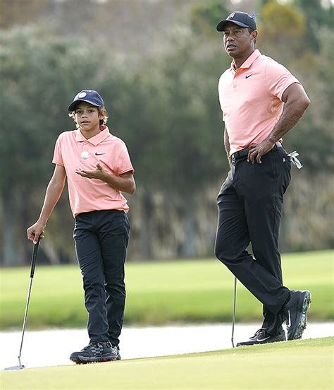 Tiger Woods Returns To The Golf Course With His Year Old Son Charlie