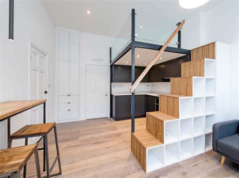Mezzanine levels create extra space by floating a room within a room. mezzanine floor