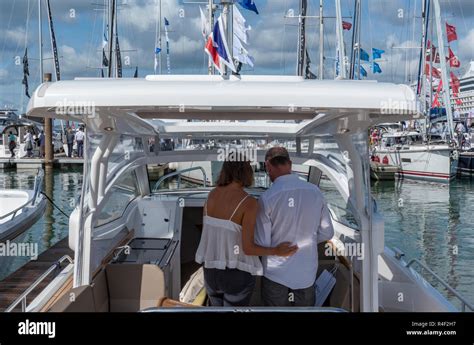 Man And Wife Couple Viewing A Boat At The Southampton International Boat Show Southampton