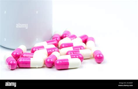 Colorful Of Antibiotic Capsules Pills With Plastic Bottle Isolated On