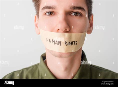 Man With Duct Tape On Mouth With Human Rights Lettering Isolated On White Stock Photo Alamy
