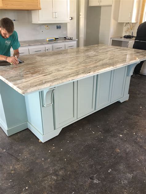 This cool, icy granite works well with white, black, blue, brown, and gray cabinets. Kitchen Island - Fantasy Brown Granite installation - 3 cm ...