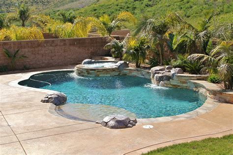 Freeform Pool And Spa Combo With Rock Waterfall Backyard Pool Backyard