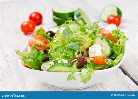 Salad With Fresh Vegetables In A Ceramic Bowl Stock Image Image Of