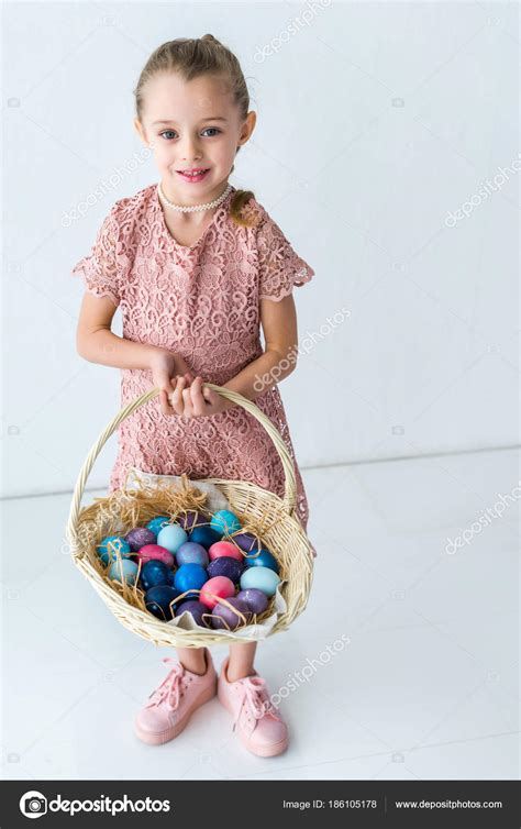Child Girl Holding Easter Eggs Basket — Stock Photo © Allaserebrina