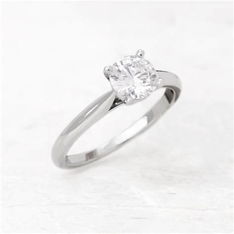 These designer engagement rings range in price from a thousand dollars to millions of dollars. Cartier Platinum 1.02ct Diamond Engagement Ring COM1135 | Second Hand Jewellery
