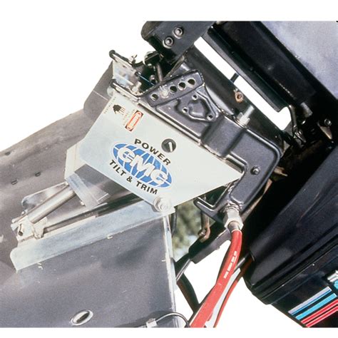 Your elec cmc elec tilt and trim will keep your motor from kicking up in reverse you must have a problem on the swivel bracket on the motor. CMC MARINE PT-35 Power Tilt & Trim | West Marine