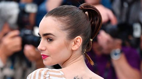 Cannes 2017 Lily Collins Wears Ponytail Wrapped In Gold