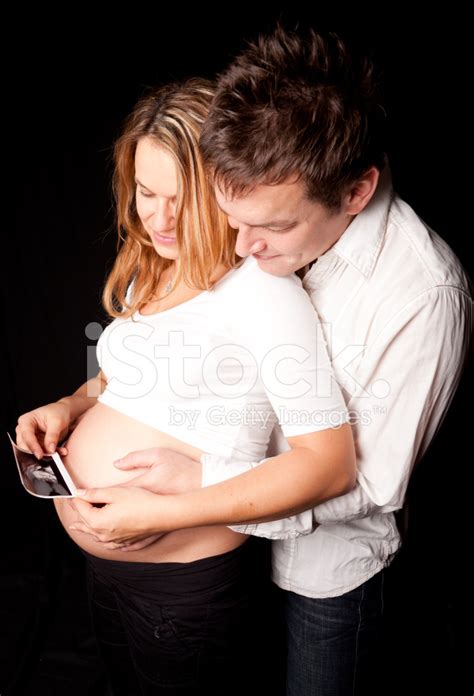 Pregnant Woman With Her Husband Stock Photo Royalty Free Freeimages