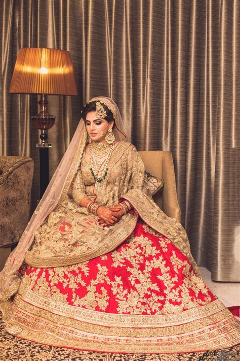 Photo Of Muslim Bridal Look In Red And Gold Lehenga Asian Bridal Dresses Bridal Dresses