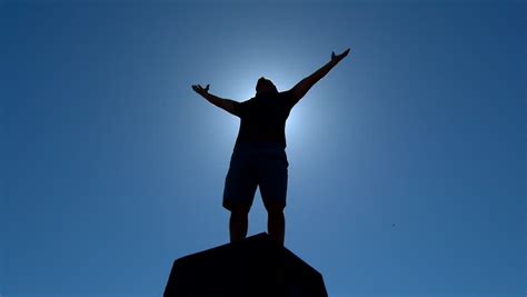 Victory Pose By Man On Top Of Hill Lifting Hands At The Sun Business