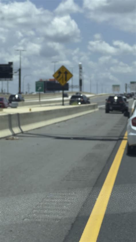 Drivers Reversing To Enter A Highway Through The Exit Lane Into