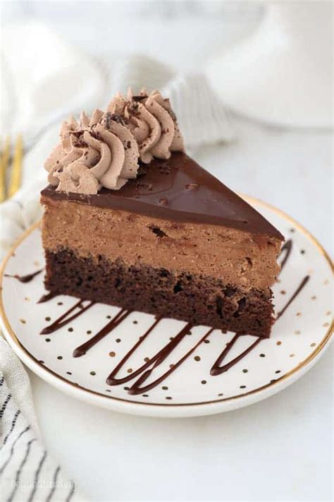 Eggless chocolate mousse cake with an eggless cake topped with a light chocolate mousse and finished with a chocolate ganache. Chocolate Mousse Cake - Beyond Frosting