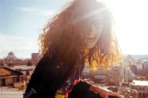 Redhead Girl Dancing And Laughing On The Rooftop By Marija Anicic