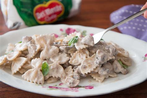 Farfalle Pasta Recipe In A Creamy Mushroom Sauce By Archanas Kitchen