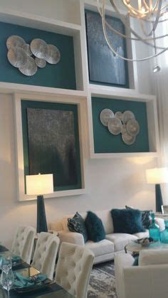 These sahel wall planters from anthropologie are a delightful way to turn your favorite plants into a vertical display. How to Decorate a TWO STORY wall! What to do with those crazy tall walls....on the cheap! | DIYs ...