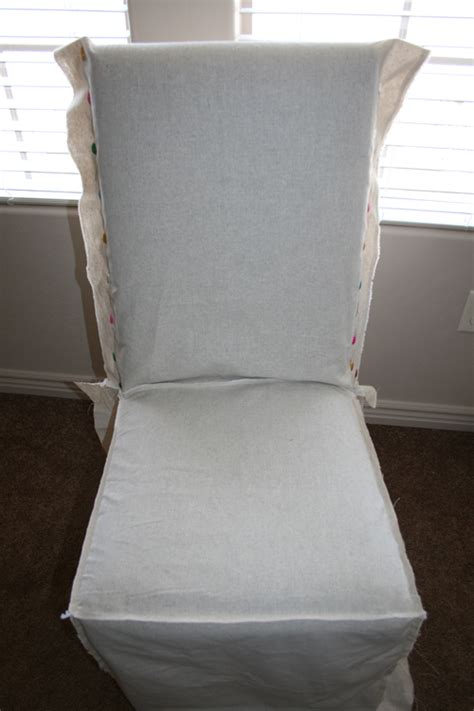 Washable slipcovers with flirty skirts and ties add function and some feminine style to any eating space. Ruthie be Maude: DIY Stenciled Parson Chair Slipcovers...