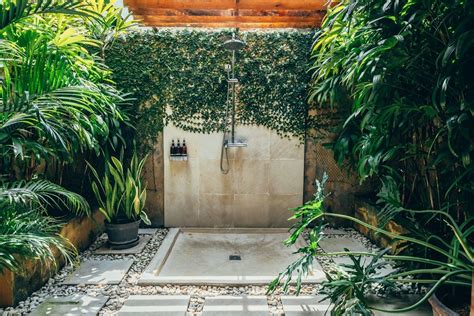 Outdoor Shower With Greened Overgrown Wall Cliff Front Villa In Bali