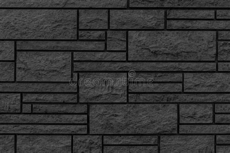 Pattern Of Black Stone Cladding Wall Tile Texture And Seamless